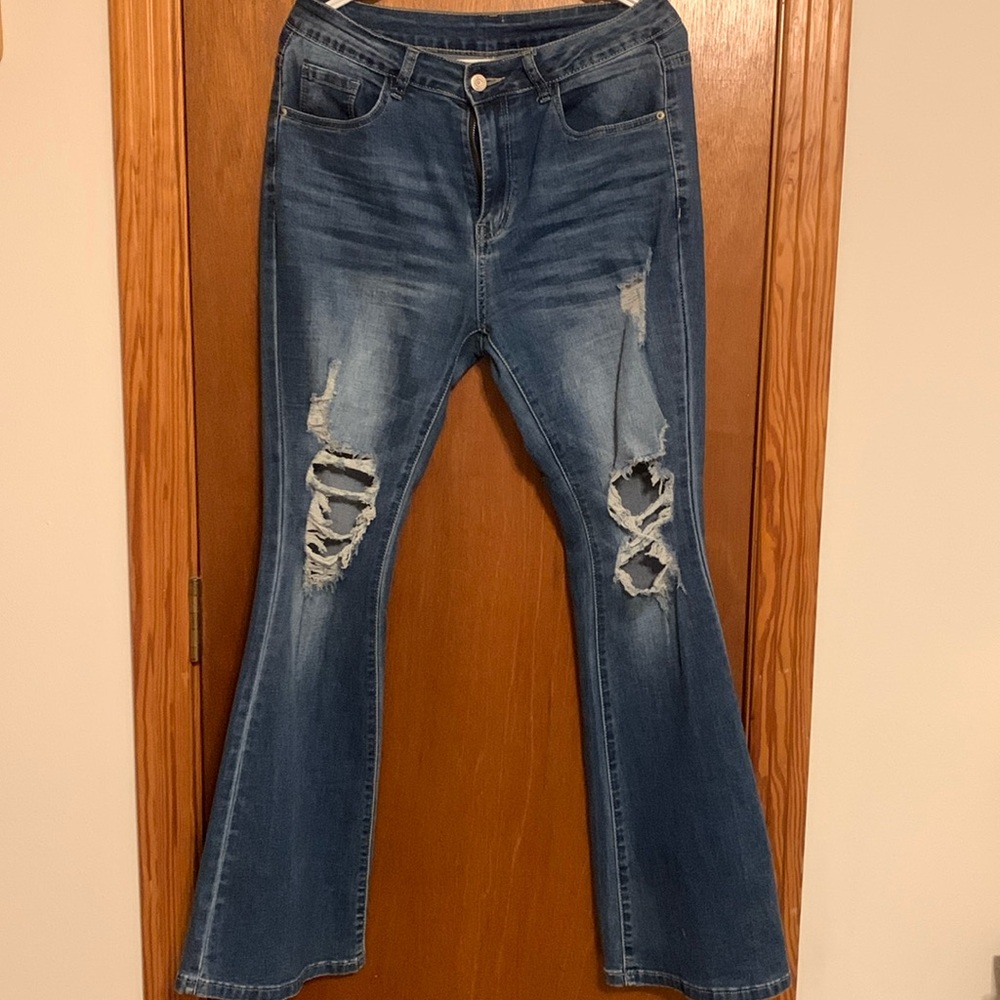 Distressed flare jeans